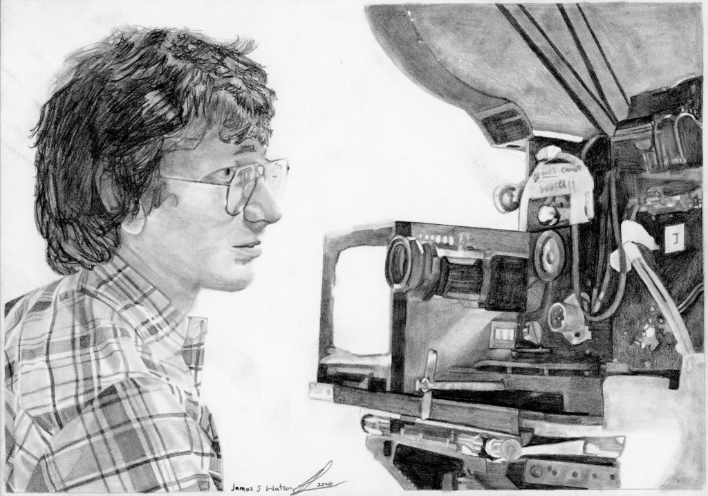 A detailed graphite pencil drawing of a young man in glasses, looking thoughtfully at a film camera. The background includes equipment associated with filmmaking, emphasizing a creative atmosphere.