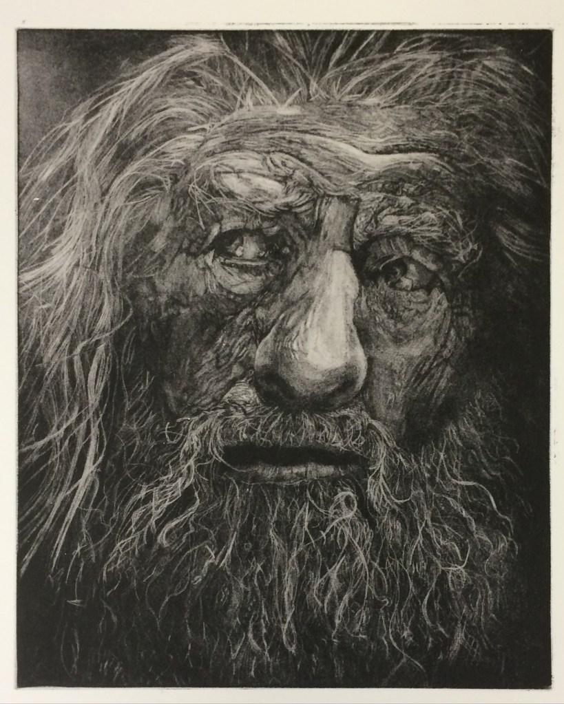A detailed print of an elderly man's face, featuring long hair and a bushy beard, showcasing intricate textures and expressive features.
